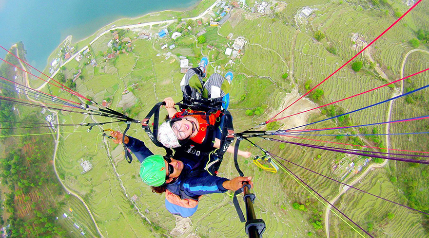 Experience exciting paragliding in the sky to overlook the beautiful Pokhara and record the special moment of Nepal journey.