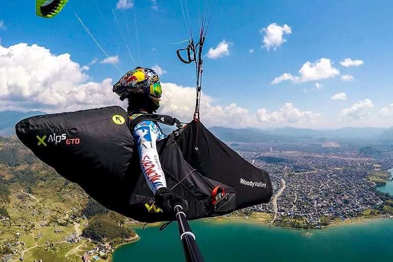 Professional Paraglider Over the Fewa Lake Pokhara Things to Do 2020