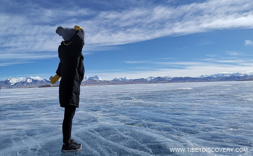 Me Standing on Frozen Phuma Yumtso Tibet Trip Story